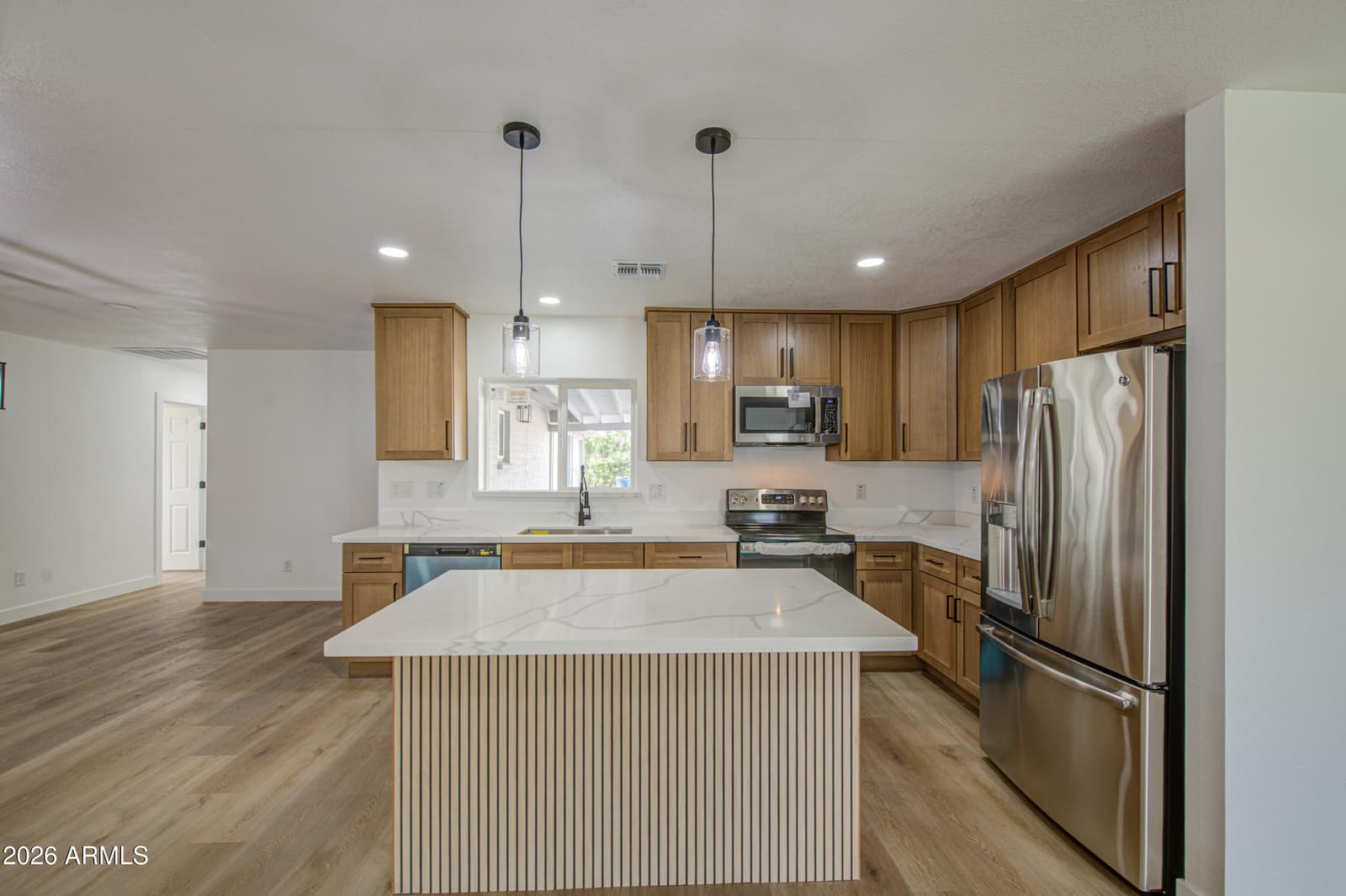 512 E NARRAMORE Avenue, Buckeye, AZ 85326 — photo 10 of 35