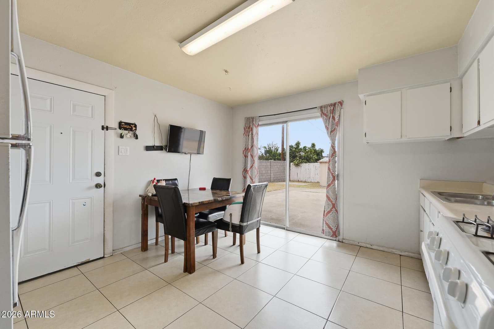 7714 W MITCHELL Drive, Phoenix, AZ 85033 — photo 6 of 13