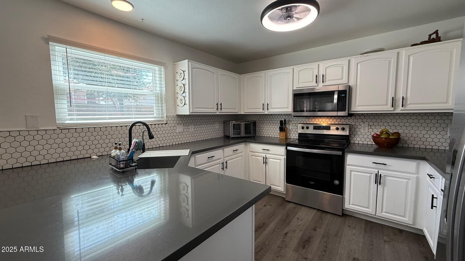 22461 W WOODLANDS Avenue, Buckeye, AZ 85326 — photo 11 of 46