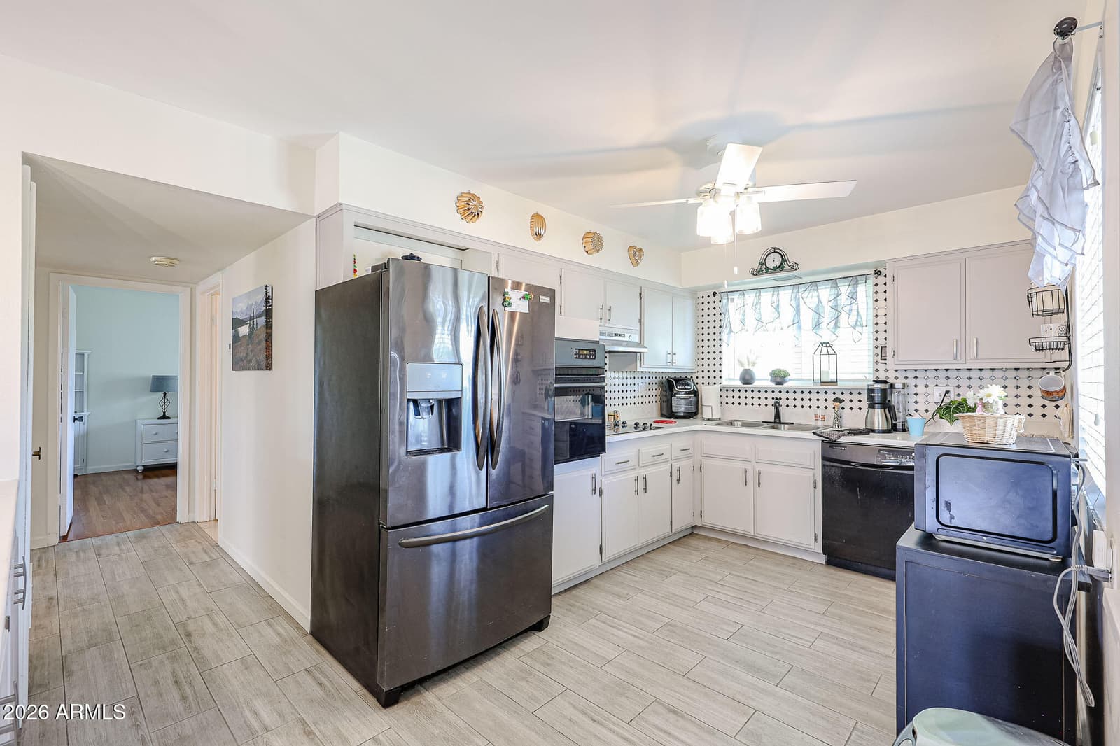 10319 W Clair Drive, Sun City, AZ 85351 — photo 7 of 30