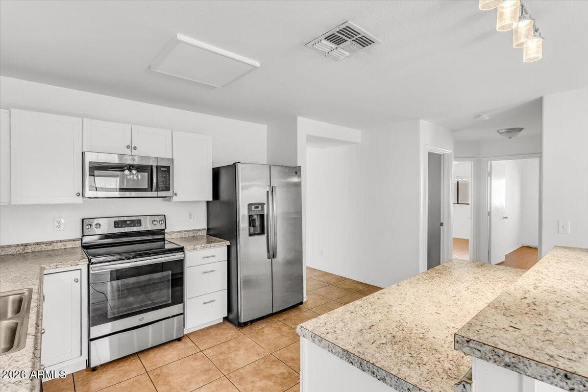 218 E Milada Drive, Phoenix, AZ 85042 — photo 11 of 34