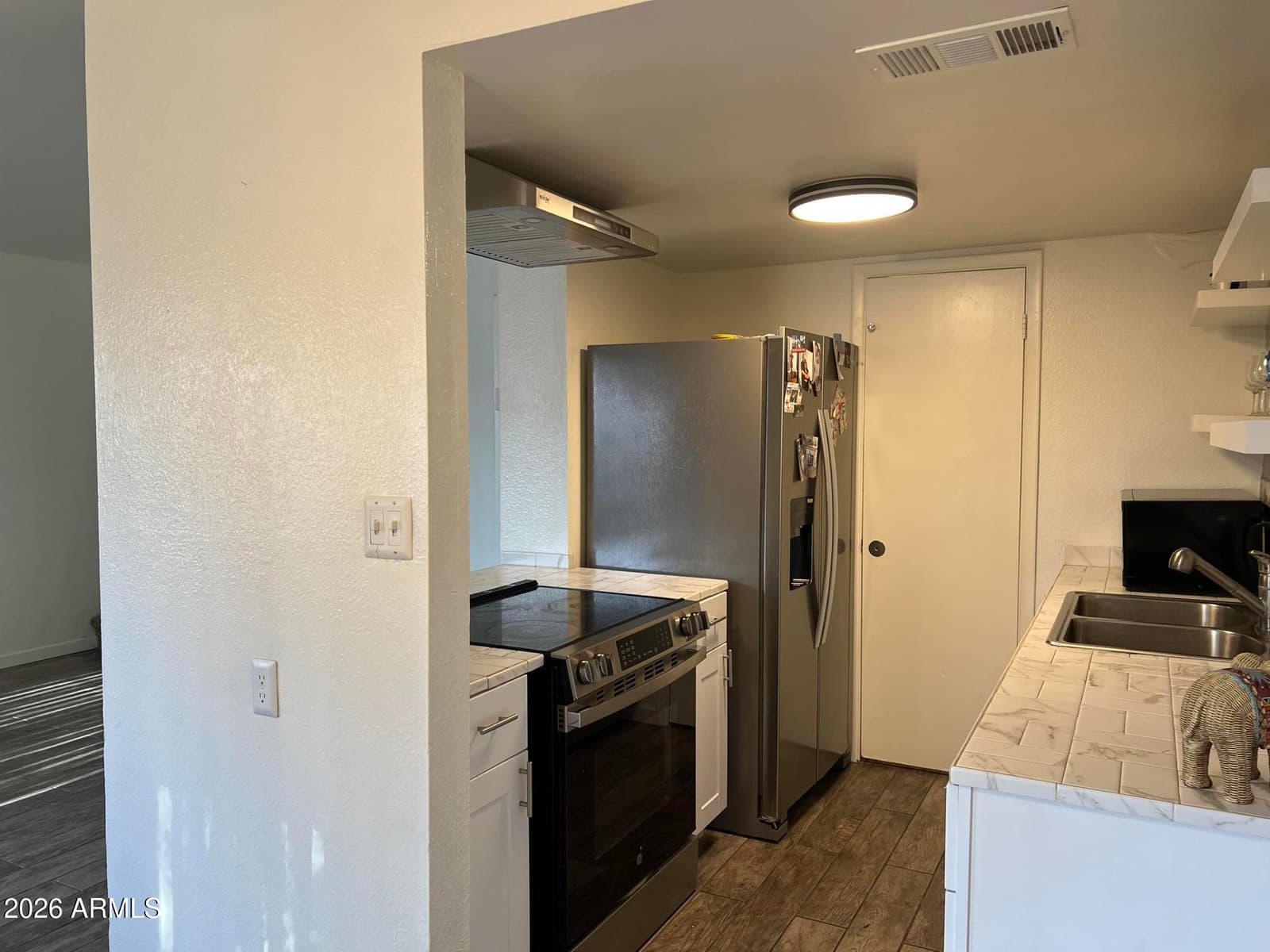 4241 N 68th Drive, Phoenix, AZ 85033 — photo 4 of 10