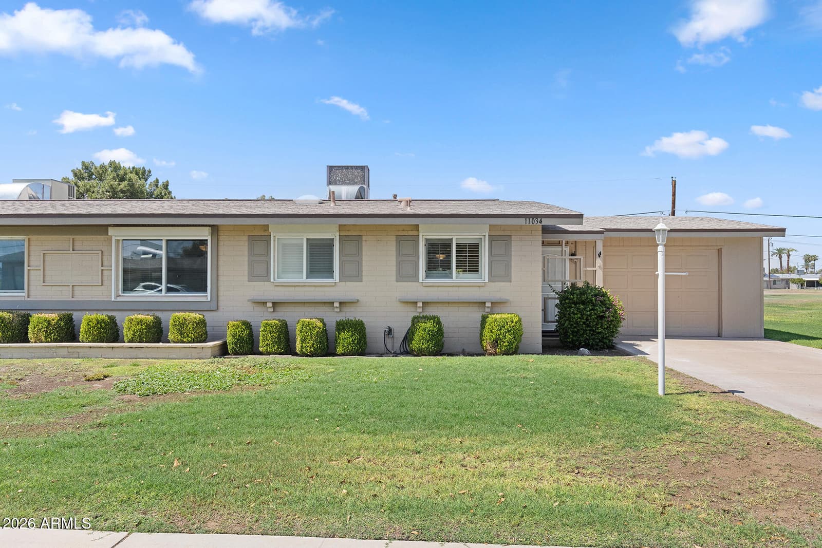 11034 N Coggins Drive, Sun City, AZ 85351 — photo 1 of 48