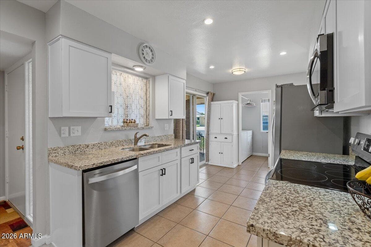 10895 W Clair Drive, Sun City, AZ 85351 — photo 7 of 26
